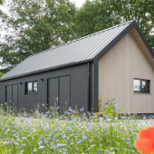 De houten schuur duurzame en multifunctionele toevoeging aan je tuin